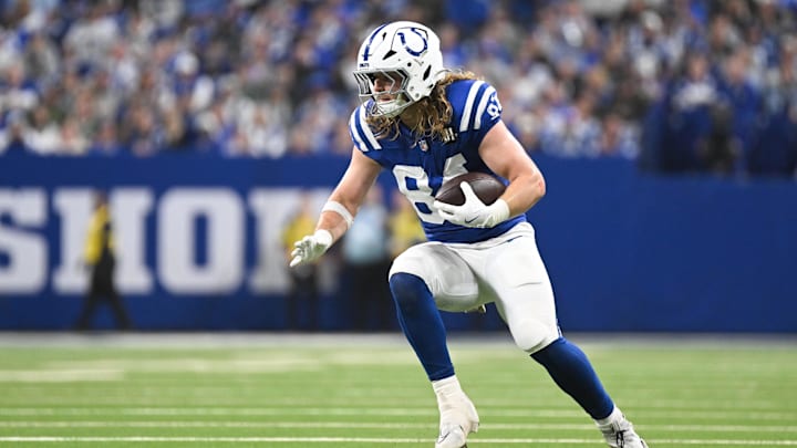 Oct 26, 2025; Indianapolis, Indiana, USA; Indianapolis Colts tight end Tyler Warren (84) rushes during the third quarter against the Tennessee Titans at Lucas Oil Stadium. 