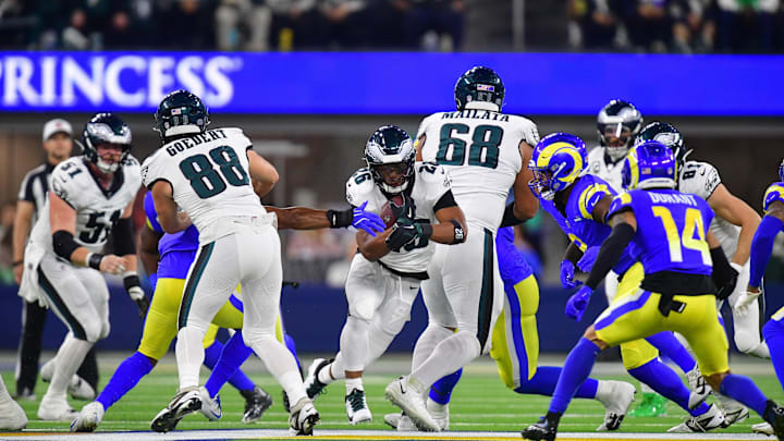  Philadelphia Eagles running back Saquon Barkley (26) runs the ball against the Los Angeles Rams during the first half at SoFi Stadium. 