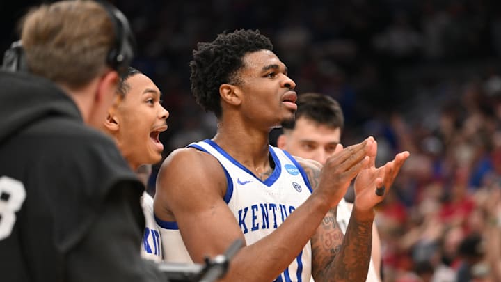 Mar 20, 2026; St. Louis, MO, USA; Kentucky Wildcats guard Otega Oweh (00) reacts after shooting a three point basket to tie the game against the Santa Clara Broncos as time expired in the second half of a first round game of the men's 2026 NCAA Tournament at Enterprise Center.  Mandatory Credit: Jeff Curry-Imagn Images