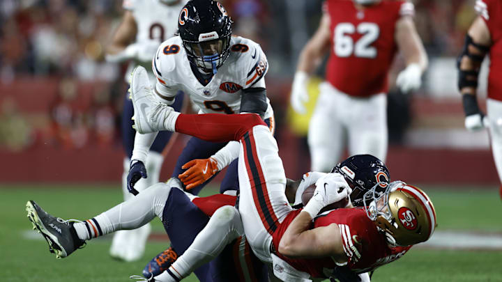 Jaquan Brisker brings down former Bears tight end Jake Tonges of the 49ers in San Francisco's 42-38 victory.