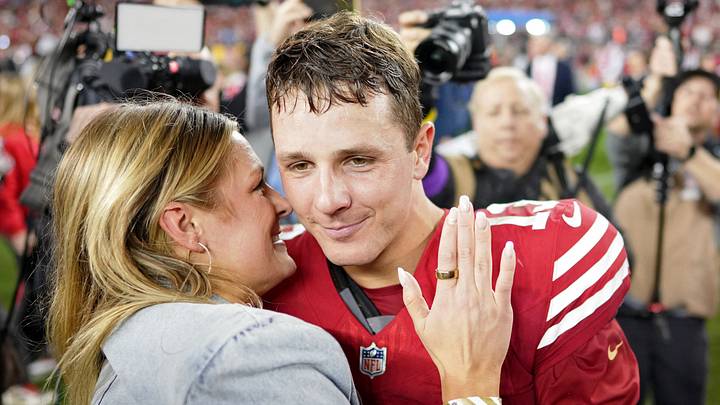 San Francisco 49ers quarterback Brock Purdy kisses his lady Jenna Brandt after winning the NFC Championship.