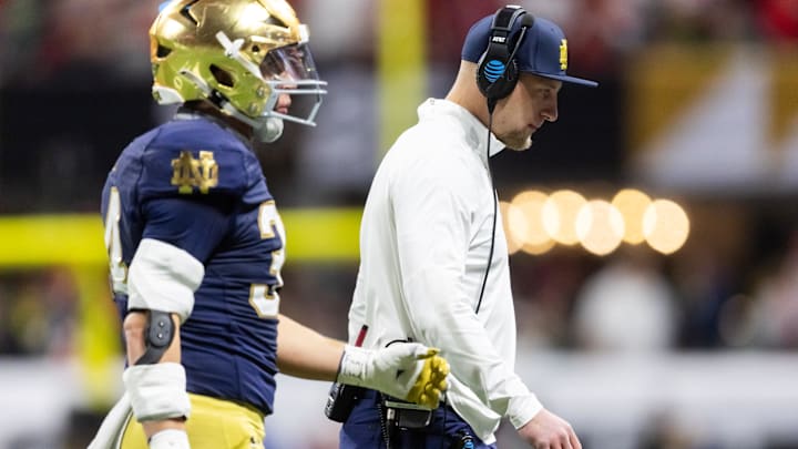 Jan 20, 2025; Atlanta, GA, USA; Notre Dame Fighting Irish linebackers coach Max Bullough against the Ohio State Buckeyes during the CFP National Championship college football game at Mercedes-Benz Stadium. Mandatory Credit: Mark J. Rebilas-Imagn Images