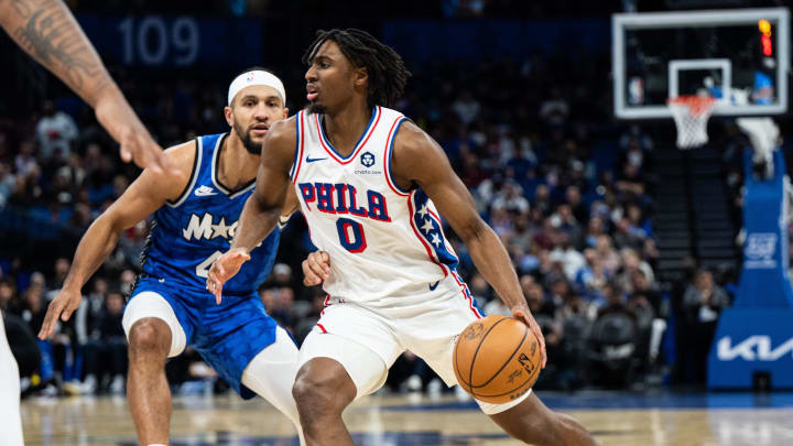 Jan 19, 2024; Orlando, Florida, USA; Philadelphia 76ers point guard Tyrese Maxey (0) dribbles the ball against the Orlando Magic in the first quarter at KIA Center. Mandatory Credit: Jeremy Reper-USA TODAY Sports