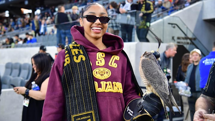 USC Trojans womens basketball guard JuJu Watkins smiles with the LAFC falcon before the game against the New York Red Bulls.