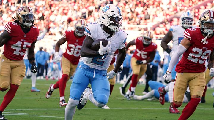 Aug 13, 2026; Santa Clara, California, USA;  Tennessee Titans running back Tyjae Spears (2) rushes the ball while pursued by San Francisco 49ers linebacker Nick Martin (45), safety Ashtyn Davis (29), and safety Marques Sigle (36) in the first quarter at Levi's Stadium. Mandatory Credit: David Gonzales-Imagn Images