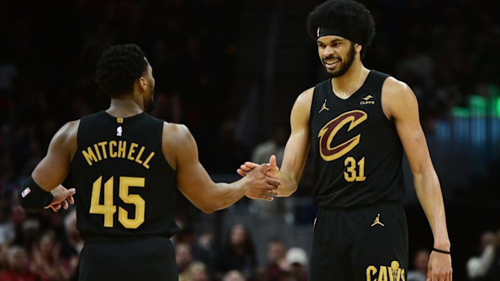 Apr 10, 2024; Cleveland, Ohio, USA; Cleveland Cavaliers guard Donovan Mitchell (45) and center Jarrett Allen (31) celebrate during the second half against the Memphis Grizzlies at Rocket Mortgage FieldHouse. Mandatory Credit: Ken Blaze-Imagn Images