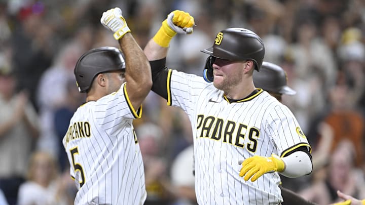 Aug 20, 2025; San Diego, California, USA; San Diego Padres left fielder Gavin Sheets (30) is congratulated by Ramon Laureano (5) after hitting a three-run home run during the third inning against the San Francisco Giants at Petco Park. Mandatory Credit: Denis Poroy-Imagn Images
