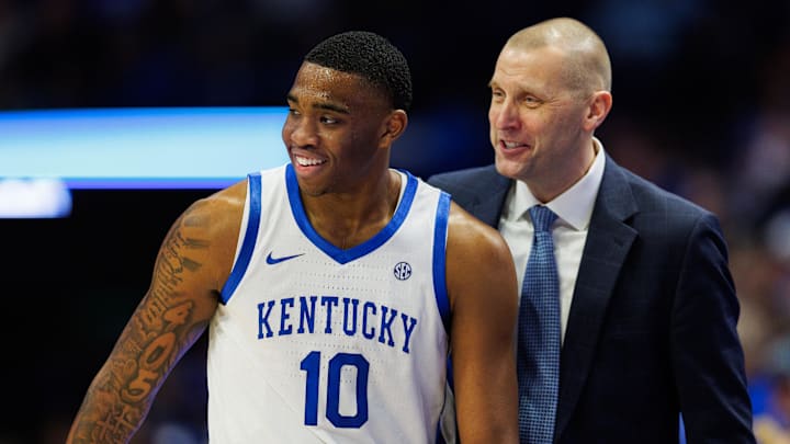 Dec 31, 2024; Lexington, Kentucky, USA; Kentucky Wildcats head coach Mark Pope talks with forward Brandon Garrison (10) during the second half against the Brown Bears at Rupp Arena at Central Bank Center. Mandatory Credit: Jordan Prather-Imagn Images