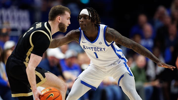Oct 24, 2025; Lexington, KY, USA; Kentucky Wildcats guard Denzel Aberdeen (1) defends against Purdue Boilermakers guard Braden Smith (3) during the second half at Rupp Arena at Central Bank Center. Mandatory Credit: Jordan Prather-Imagn Images