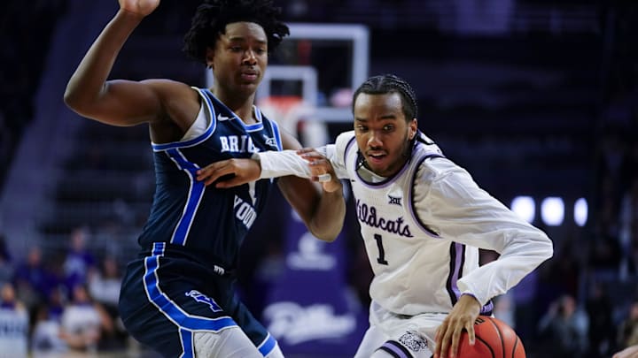 Kansas State Wildcats guard Abdi Bashir Jr. (1) defends the ball from BYU Cougars guard Robert Wright III (1) during the game inside Bramlage Coliseum on Jan. 3, 2026.