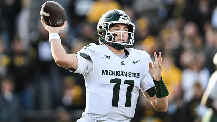 Michigan State Spartans quarterback Alessio Milivojevic throws a pass against the Iowa Hawkeyes. Michigan State Spartans quarterback Alessio Milivojevic throws a pass against the Iowa Hawkeyes.