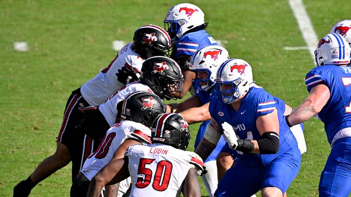 The SMU Mustangs face the Louisville Cardinals. Mandatory Credit: Jerome Miron-Imagn Images The SMU Mustangs face the Louisville Cardinals. Mandatory Credit: Jerome Miron-Imagn Images