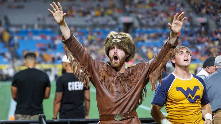 The West Virginia Mountaineers mascot. The West Virginia Mountaineers mascot.
