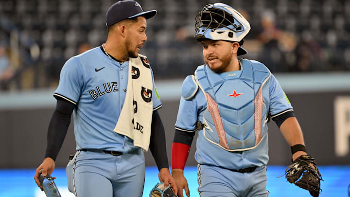 May 1, 2025; Toronto, Ontario, CAN;  Toronto Blue Jays starting pitcher Jose Berrios (17) speaks with catcher Alejandro Kirk (30) as they prepare to face the Boston Red Sox at Rogers Centre.