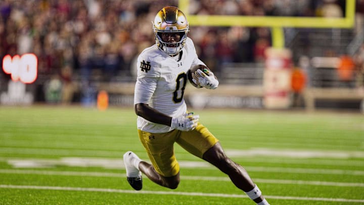 Nov 1, 2025; Chestnut Hill, Massachusetts, USA; Notre Dame Fighting Irish wide receiver Malachi Fields (0) runs after a catch in the fourth quarter against the Boston College Eagles at Alumni Stadium. Mandatory Credit: Edward Finan-Imagn Images