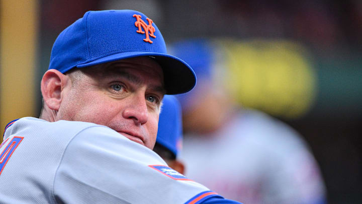 Mar 30, 2026; St. Louis, Missouri, USA; New York Mets manager Carlos Mendoza (64) looks on before a game against the St. Louis Cardinals at Busch Stadium. Mandatory Credit: Jeff Curry-Imagn Images