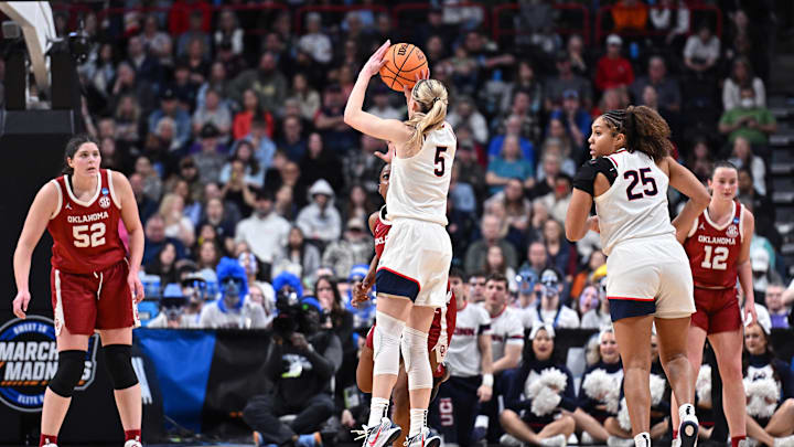 Mar 29, 2025; Spokane, WA, USA; UConn Huskies guard Paige Bueckers (5) shoots against the Oklahoma Sooners during the second half of a Sweet 16 NCAA Tournament basketball game at Spokane Arena. Mandatory Credit: James Snook-Imagn Images