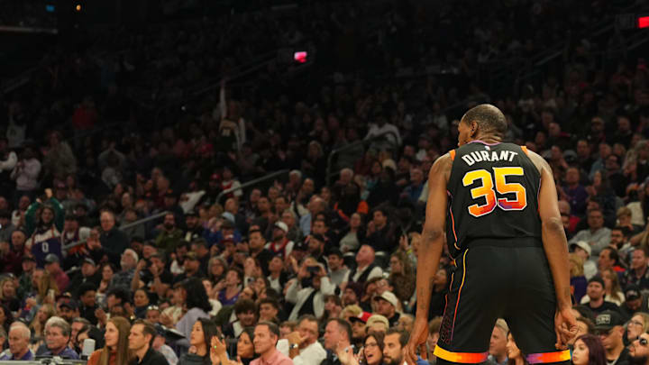 Feb 11, 2025; Phoenix, Arizona, USA; Phoenix Suns forward Kevin Durant (35) reacts after making a free throw during the second half against the Memphis Grizzlies to amass 30,000 career points at Footprint Center. Mandatory Credit: Joe Camporeale-Imagn Images
