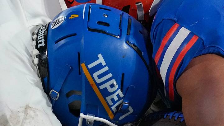 Tupelo's defensive back Iverson McCoy (4) and Gulfport's running back Cooper Crosby (5) go head-to-head during the MHSAA Class 7A state championship title game at Davis Wade Stadium, in Starkville, Miss., on Saturday, Dec. 6, 2025.