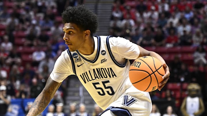 Mar 20, 2026; San Diego, CA, USA; Villanova Wildcats guard Acaden Lewis (55) controls the ball against the Utah State Aggies in the first half during a first round game of the men's 2026 NCAA Tournament at Viejas Arena. Mandatory Credit: Denis Poroy-Imagn Images