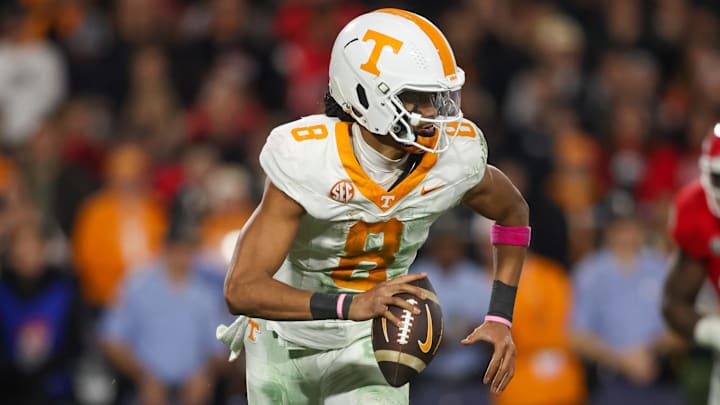 Nov 16, 2024; Athens, Georgia, USA; Tennessee Volunteers quarterback Nico Iamaleava (8) scrambles against the Georgia Bulldogs in the second quarter at Sanford Stadium. Mandatory Credit: Brett Davis-Imagn Images