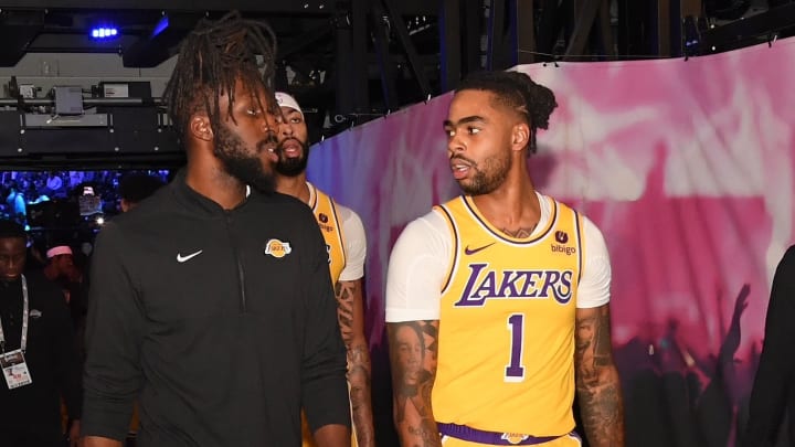 Los Angeles Lakers assistant coach DeMarre Carroll (left) and guard DeAngelo Russell (right).