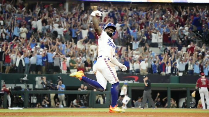 Texas Rangers Adolis Garcia (53) hits a walk-off home run against Arizona Diamondbacks relief pitcher Miguel Castro (50) in the 11th inning during Game 1 of 2023 World Series at Globe Life Field in Arlington, Texas, on Oct. 27, 2023.