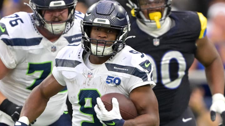 Nov 16, 2025; Inglewood, California, USA; Seattle Seahawks running back Kenneth Walker III (9) carries the ball against the Los Angeles Rams at SoFi Stadium. Nov 16, 2025; Inglewood, California, USA; Seattle Seahawks running back Kenneth Walker III (9) carries the ball against the Los Angeles Rams at SoFi Stadium.