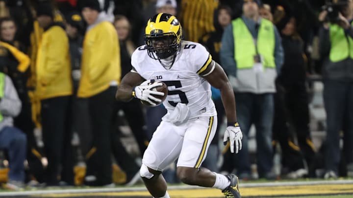 Nov 12, 2016; Iowa City, IA, USA; Michigan Wolverines linebacker Jabrill Peppers (5) carries the football against the Iowa Hawkeyes at Kinnick Stadium. Iowa beat Michigan 14 to 13. Mandatory Credit: Reese Strickland-Imagn Images Nov 12, 2016; Iowa City, IA, USA; Michigan Wolverines linebacker Jabrill Peppers (5) carries the football against the Iowa Hawkeyes at Kinnick Stadium. Iowa beat Michigan 14 to 13. Mandatory Credit: Reese Strickland-Imagn Images