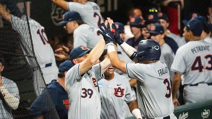 Behind the bat of catcher Chase Fralick, who hit his record-breaking fifth homer in the regional round, Auburn keep playing into Monday of the NCAA Tournament. Behind the bat of catcher Chase Fralick, who hit his record-breaking fifth homer in the regional round, Auburn keep playing into Monday of the NCAA Tournament.