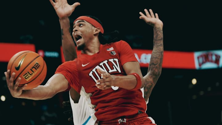 UNLV’s Howie Fleming Jr. (3) lays up the ball against the Memphis Tigers during a basketball game 