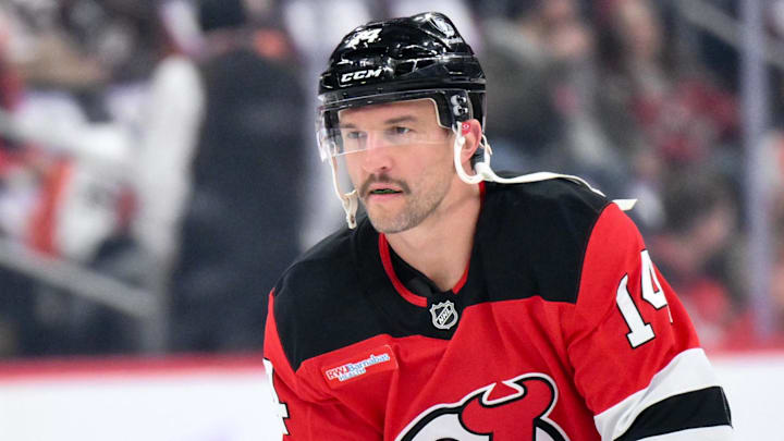 New Jersey Devils center Luke Glendening (14) warms up before a game against the Philadelphia Flyers: John Jones-Imagn Images