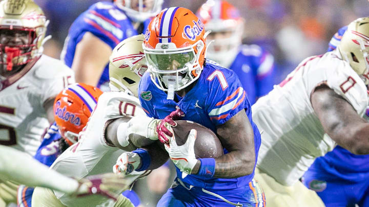 Florida Gators running back Trevor Etienne (7) makes yards during first half action as Florida takes