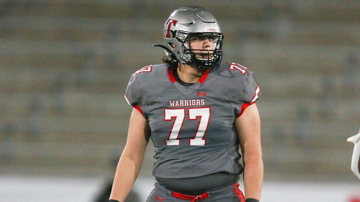 Thompson offensive lineman Stanton Ramil (77) waits for a play to begin during the 7A state championship game in Birmingham Wednesday, Dec. 1, 2021. [Staff Photo/Gary Cosby Jr]

7a Championship Central Vs Thompson