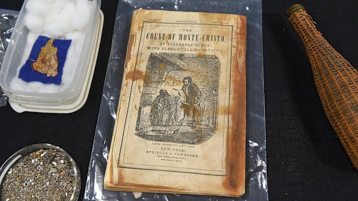 A first edition of \"The Count of Monte Cristo\" from the S.S. Central America is seen in a warehouse in Sparks, Nevada on May 4, 2022. The S.S. Central America sunk about 160 miles off the coast of South Carolina in 1857.

Ren Shipwreck Artifacts 18