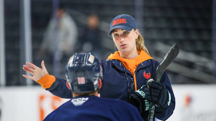 Coachella Valley Firebirds assistant coach Jessica Campbell talks to Firebirds forward Cameron Hughes (19) during practice at Acrisure Arena in Palm Desert, Calif., on Tuesday, May 28, 2024.
