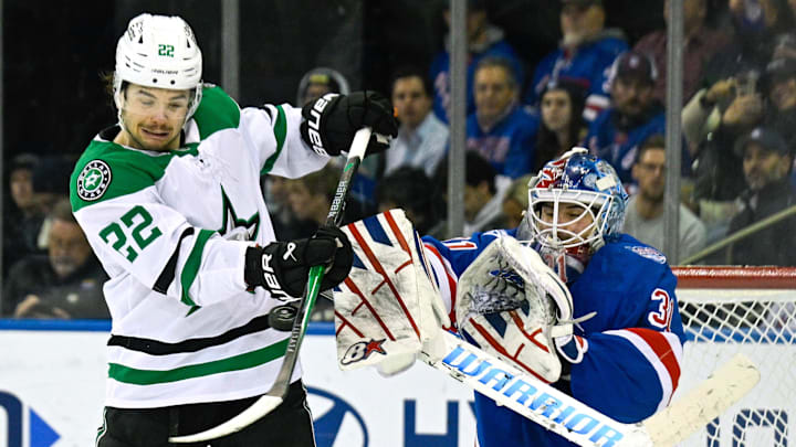 Dec 2, 2025; New York, New York, USA;  Dallas Stars center Mavrik Bourque (22) deflects the puck in front go New York Rangers goaltender Igor Shesterkin (31) during the second period at Madison Square Garden. Mandatory Credit: Dennis Schneidler-Imagn Images