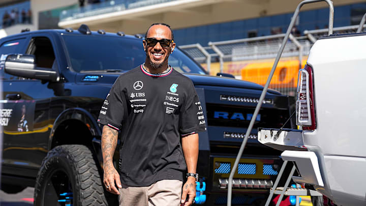 Oct 20, 2024; Austin, Texas, USA; Mercedes-AMG Petronas driver Lewis Hamilton walks the track ahead of the drivers' parade at the Formula 1 Pirelli United States Grand Prix at Circuit of the Americas. Mandatory Credit: Aaron E. Martinez-Imagn Images
