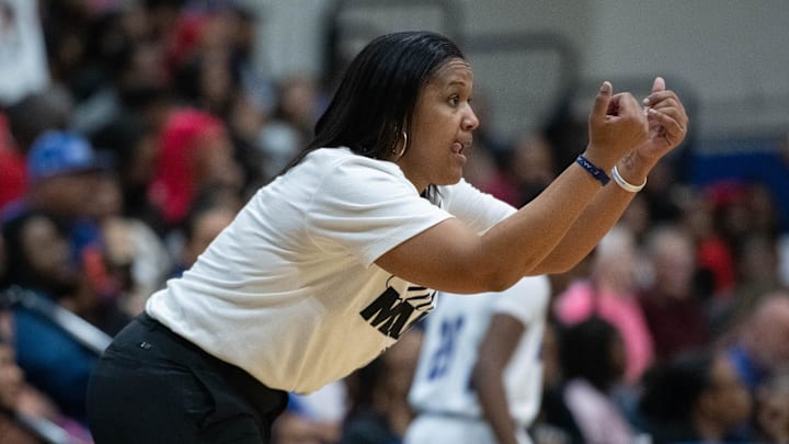 Wildcats head coach Jade Brown instructs her players during the Mainland vs Washington girls 5A Regional Finals basketball game at Booker T. Washington High School in Pensacola on Thursday, Feb. 22, 2024.