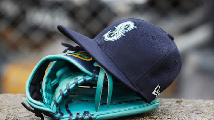 May 12, 2018; Detroit, MI, USA; Hat and glove of Seattle Mariners center fielder Dee Gordon (9) sits in dugout during the third inning against the Detroit Tigers at Comerica Park. Mandatory Credit: Rick Osentoski-Imagn Images