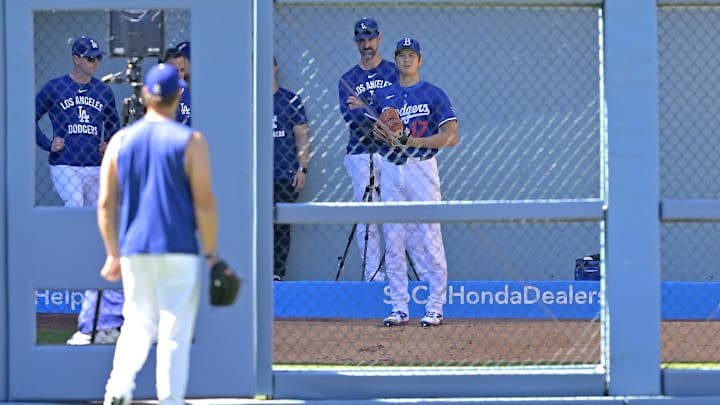 May 21, 2025; Los Angeles, California, USA; Los Angeles Dodgers starting pitcher Clayton Kershaw (22), left, looks on as designated hitter Shohei Ohtani (17) throws in the bullpen prior to the game against the Arizona Diamondbacks at Dodger Stadium. Mandatory Credit: Jayne Kamin-Oncea-Imagn Images May 21, 2025; Los Angeles, California, USA; Los Angeles Dodgers starting pitcher Clayton Kershaw (22), left, looks on as designated hitter Shohei Ohtani (17) throws in the bullpen prior to the game against the Arizona Diamondbacks at Dodger Stadium. Mandatory Credit: Jayne Kamin-Oncea-Imagn Images