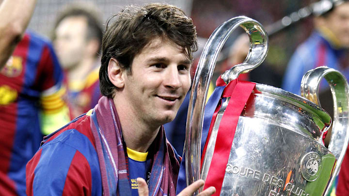 May 28, 2011; London, ENGLAND; FC Barcelona player Lionel Messi celebrates with the trophy after defeating Manchester United 3-1 in the 2011 UEFA Champions League final at Wembley Stadium. Mandatory Credit: Walter Luger/GEPA via Imagn Images