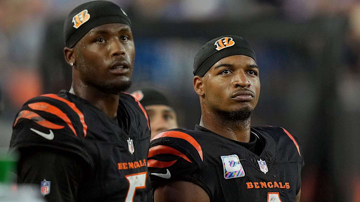 Cincinnati Bengals wide receiver Tee Higgins (5) and wide receiver Ja'Marr Chase (1) watch the score board as their team lose to the Detroit Lions 24-37 at Paycor Stadium on October 5, 2025.