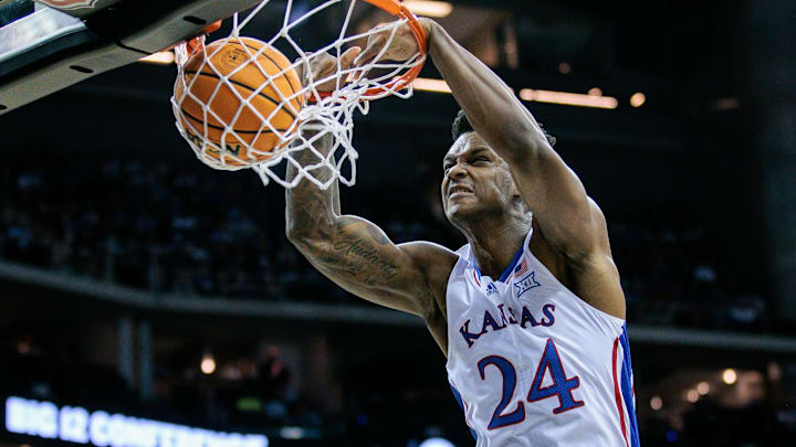 Mar 13, 2024; Kansas City, MO, USA; Kansas Jayhawks forward K.J. Adams Jr. (24) dunks during the