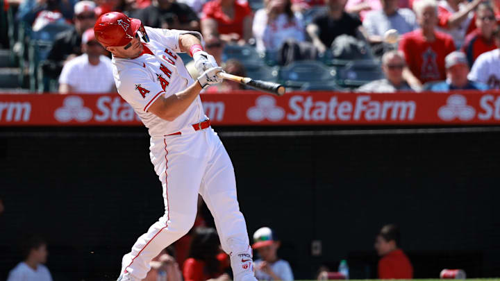 Apr 24, 2024; Anaheim, California, USA;  Los Angeles Angels designated hitter Mike Trout (27) hits a home run during the sixth inning against the Baltimore Orioles at Angel Stadium. Mandatory Credit: Kiyoshi Mio-Imagn Images