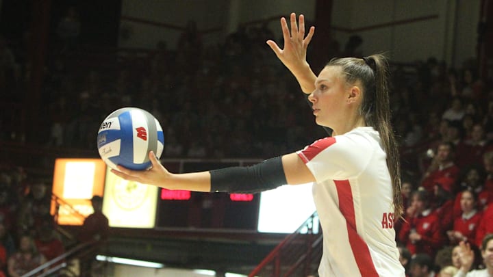 Wisconsin's Izzy Ashburn prepares to make a serve during the team's match with Miami at the UW Field House in Madison, Wis. on Friday Sept. 8, 2023.