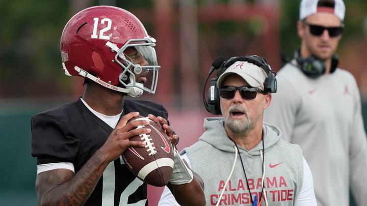 July 30, 2025; Tuscaloosa, AL, USA; Quarterback Keelon Russell drops back under the watch of offensive coordinator Ryan Grubb during the first practice session of the preseason for the Alabama Crimson Tide. July 30, 2025; Tuscaloosa, AL, USA; Quarterback Keelon Russell drops back under the watch of offensive coordinator Ryan Grubb during the first practice session of the preseason for the Alabama Crimson Tide.