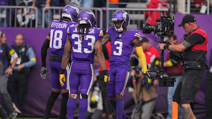 Nov 16, 2025; Minneapolis, Minnesota, USA; Minnesota Vikings wide receiver Jordan Addison (3) celebrates a touchdown with wide receiver Justin Jefferson (18) and running back Aaron Jones (33) during the fourth quarter against the Chicago Bears at U.S. Bank Stadium. Mandatory Credit: Brad Rempel-Imagn Images