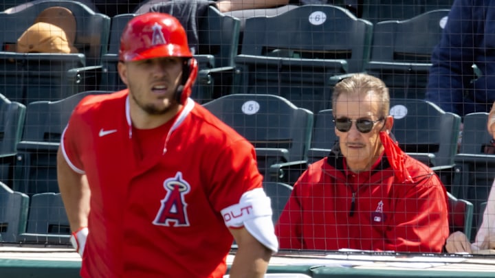 Mar 16, 2021; Tempe, Arizona, USA; Los Angeles Angels owner Arte Moreno (right) and outfielder Mike Trout against the Cleveland Indians during a Spring Training game at Tempe Diablo Stadium. Mandatory Credit: Mark J. Rebilas-Imagn Images Mar 16, 2021; Tempe, Arizona, USA; Los Angeles Angels owner Arte Moreno (right) and outfielder Mike Trout against the Cleveland Indians during a Spring Training game at Tempe Diablo Stadium. Mandatory Credit: Mark J. Rebilas-Imagn Images