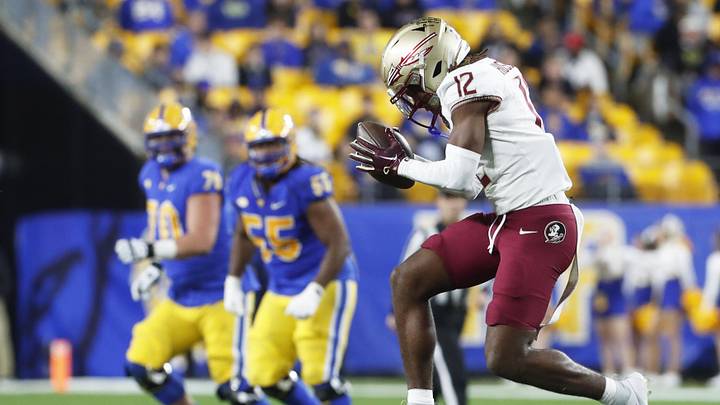 Nov 4, 2023; Pittsburgh, Pennsylvania, USA;  Florida State Seminoles defensive back Conrad Hussey (12) reacts after intercepting a pass against the Pittsburgh Panthers during the fourth quarter at Acrisure Stadium. The Seminoles won 24-7. Mandatory Credit: Charles LeClaire-Imagn Images